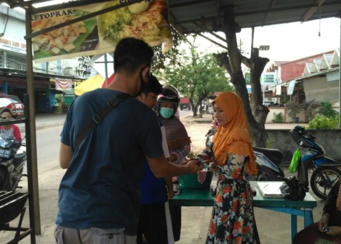 Menjelang Idulfitri , AJK Kembali Bagikan 500 Masker Kain